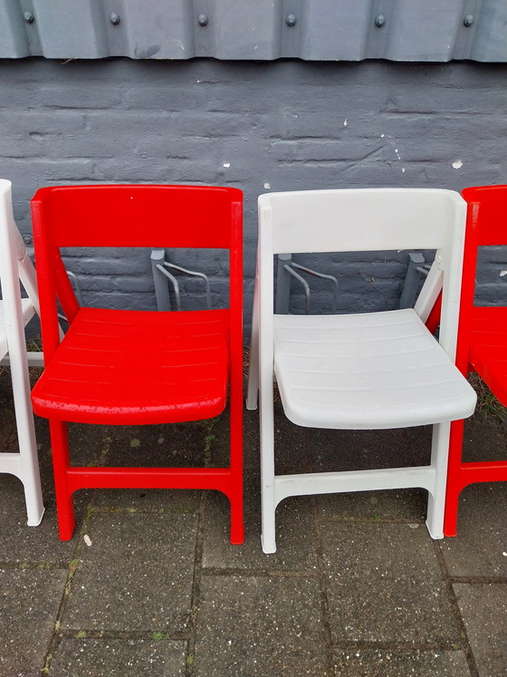 Image 1 of Juego de 5 sillas plegables de plástico Flair Pizzicato en rojo y blanco. Años 70.