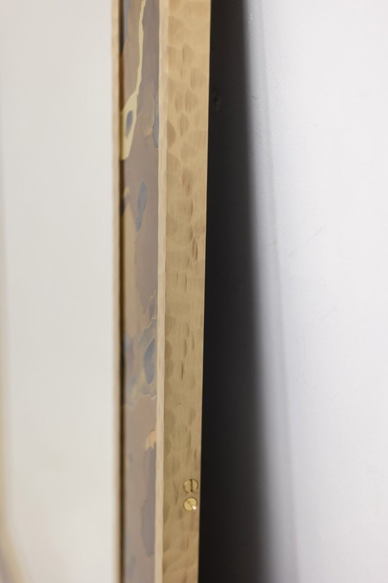 Image 1 of Mirror in marquetry of oxidized and patinated brass. Artist's work