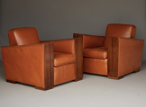 Indrukwekkend paar Art Deco leren fauteuils. 1940s.