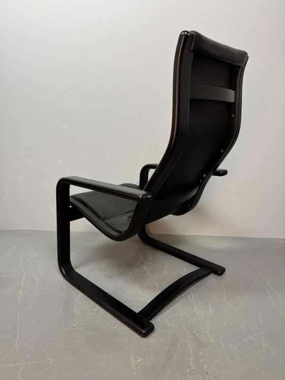 Image 1 of Mid-CenturyDesign Black Leather Lamino Lounge Chair on Black Lacquered Plywood Frame by  Yngve Ekstrom. Denmark, 1970s.