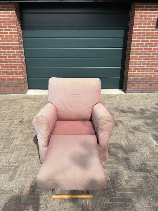 Chair with folding ottoman Italian design