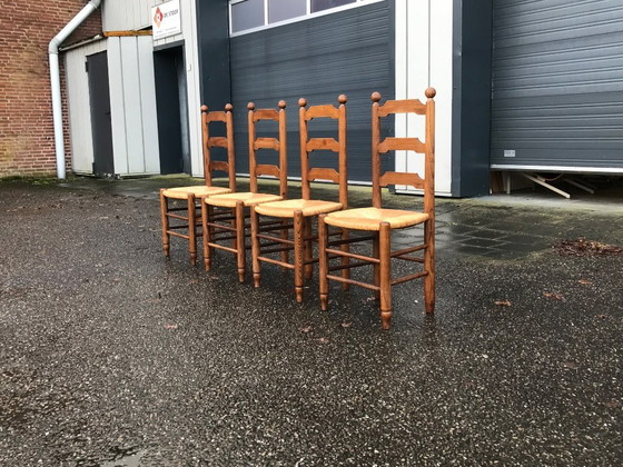 Image 1 of Esszimmerstühle aus Eiche und Geflecht Georges Robert France 1960s