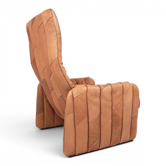 Image 1 of De Sede Ds 50 fauteuil met voetenbank, bekleed met buffelleer en patchwork, 1970