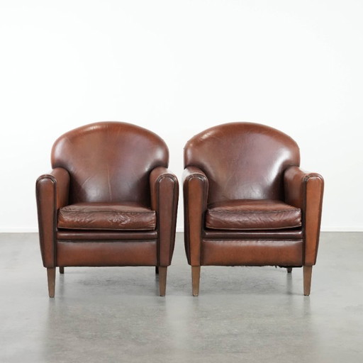 2 x Beautifully shaped sheepskin Art Deco design armchairs