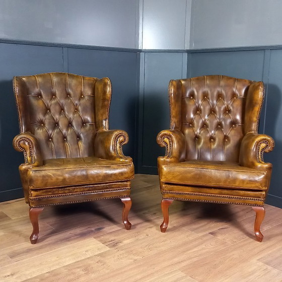 Image 1 of een Set van twee cognac kleurige Vintage chesterfield fauteuils