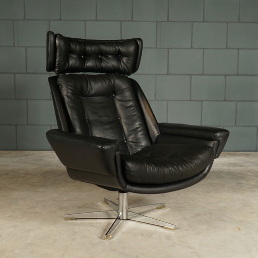 Vintage zwarte draaifauteuil – skaileder – jaren 60