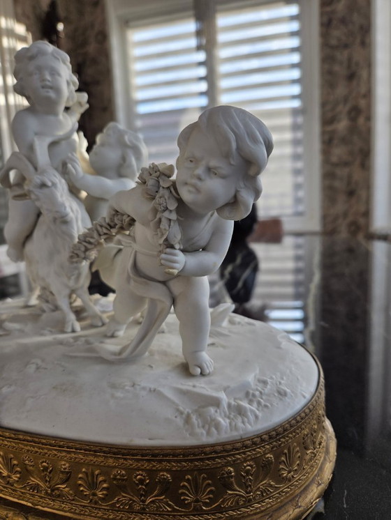 Image 1 of Sculpture - Biscuit - Groupe avec Puttis et bouc de la fin du 19ème siècle (ref 3770)