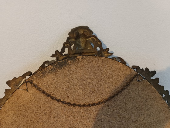 Image 1 of Vintage oval cast iron mirror