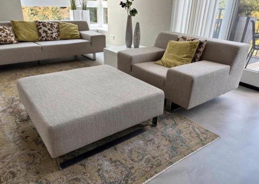 Sillón y reposapiés Goossens Milán