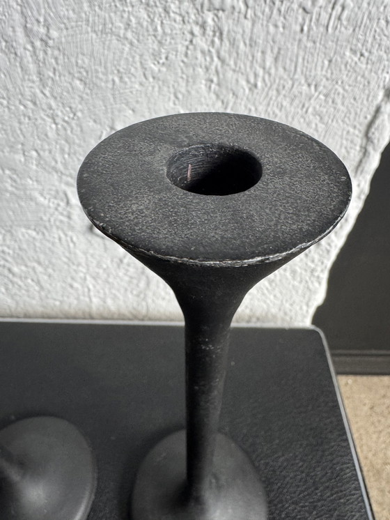 Image 1 of Black Memphis-style candlesticks from the 1980s
