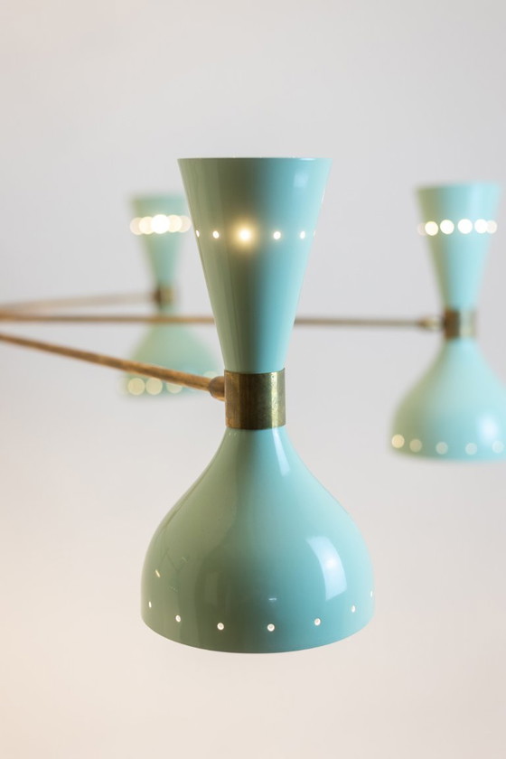 Image 1 of Lustre rayonnant de forme diabolo à 12 lumières. Contemporain.