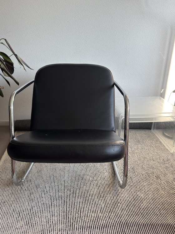 Image 1 of Sedia a dondolo vintage con struttura tubolare