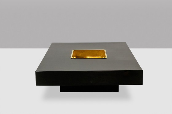 Image 1 of Willy Rizzo. Mesa de centro de madera lacada en negro y latón dorado. Años 70.