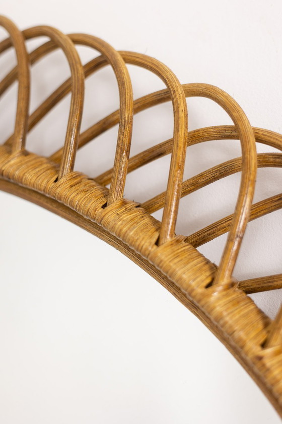 Image 1 of Pair of Round Wicker Mirrors with Interlacing. Circa 1980.