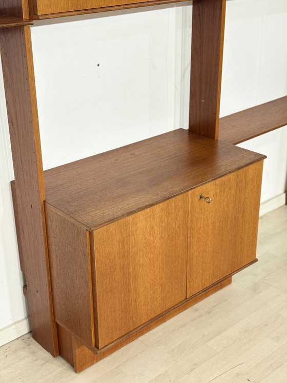 Modular mid-century wall shelf by interna-Peter Pedrides / Teak shelving system 1960s – Shelving unit, Wood (photo 17 of 27)