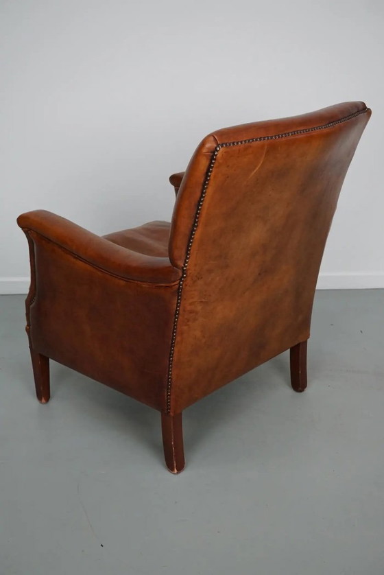 Image 1 of Vintage Nederlandse clubfauteuil van cognackleurig leer