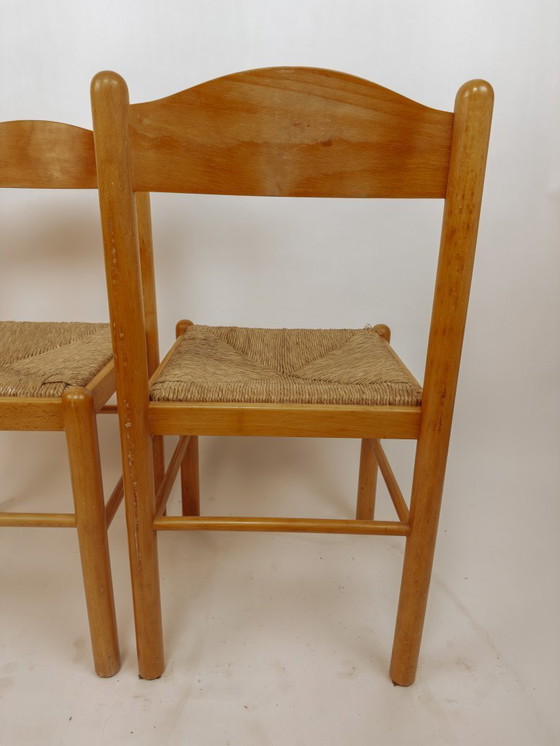 Image 1 of 2x houten Scandinavische eetkamerstoelen met biezen zitting