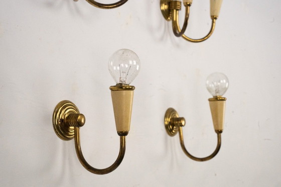 Image 1 of Set di quattro appliques di metà secolo in lacca e ottone. Italia anni '50