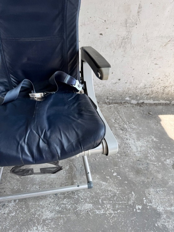 Image 1 of Vintage driepersoons vliegtuigstoelen - Recaro