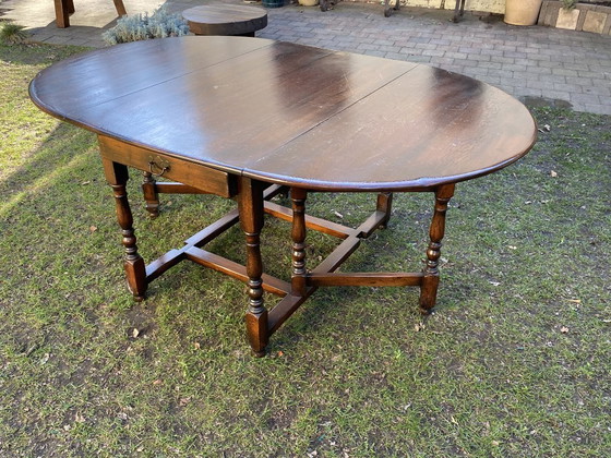 Image 1 of Antique English gateleg table, solid wood, oval, extendable