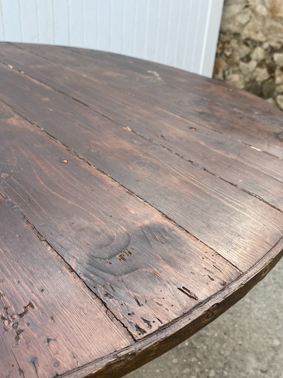 Image 1 of antique folding round winemaker's target table with tilting top