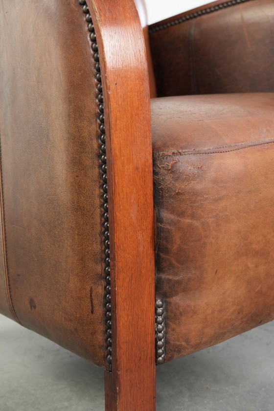 Image 1 of Beautiful sheepskin armchair in Art Deco style with wooden armrests
