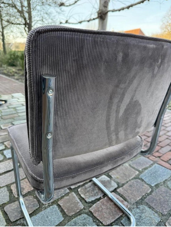 Image 1 of 8 sillas de tela acanalada pura con estructura tubular cromada