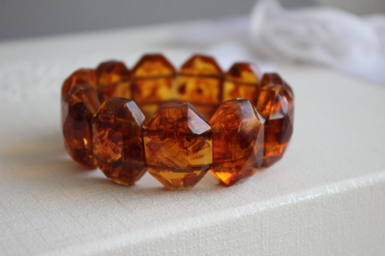 Image 1 of Amber bracelet, intricately cut, 46 grams of honey amber.