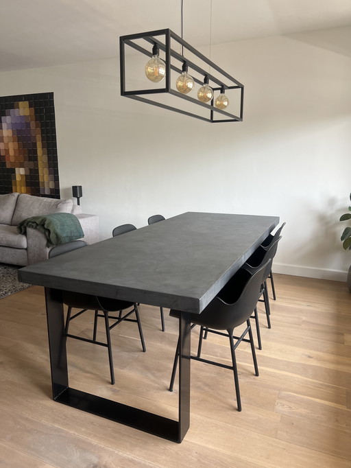 Dining table with Concrete Ciré table top and steel base