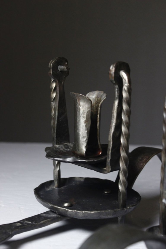 Image 1 of Pair of wrought iron castle-style wall sconces with candles, mid-20th century