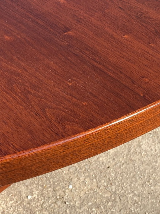 Image 1 of Baumann round oval extendable Scandinavian table in rosewood with 2 extensions, length 166 to 256cm, an60