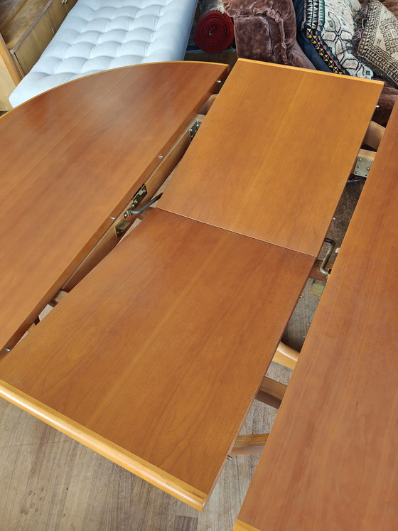 Image 1 of Extendable round to oval dining table