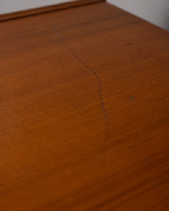 Image 1 of Vintage teakhouten dressoir uit de jaren 60 met wandmontagesysteem, Italiaans design.