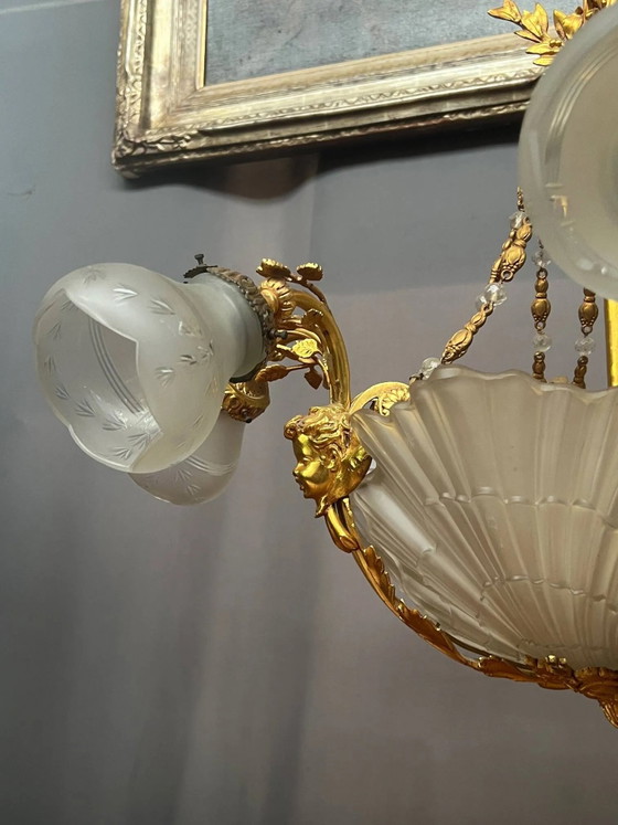 Gouden bronzen kroonluchter in Lodewijk XVI-stijl. 12 lichtpunten. (photo 4 of 8)