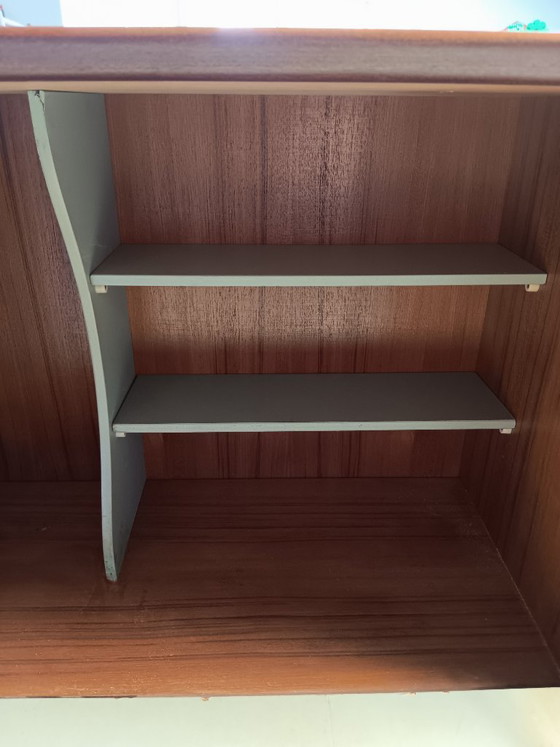 Image 1 of Teak-Highboard aus der Mitte des 20. Jahrhunderts von Oswald Vermaercke – Klappschrank mit originaler grüner Innenausstattung