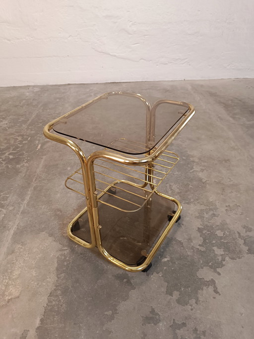 Vintage gold coloured and glass trolley side table