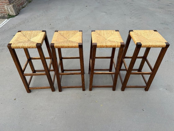 Image 1 of set van 4 houten barkrukken met rotan zitting