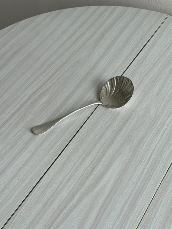 Image 1 of Grande cuillère ancienne en forme de coquillage
