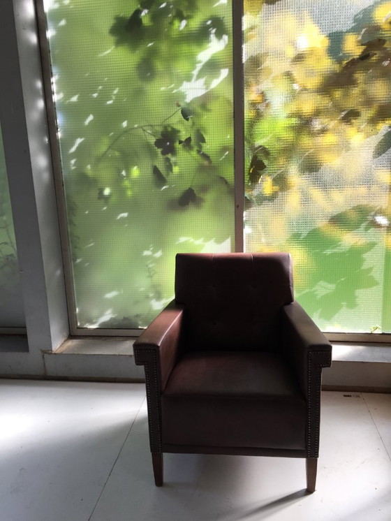 Image 1 of Unique "1930s armchair" with dark brown quality leather.