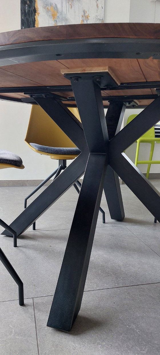 Image 1 of Round solid wood dining table 120 cm – Xooon – industrial design