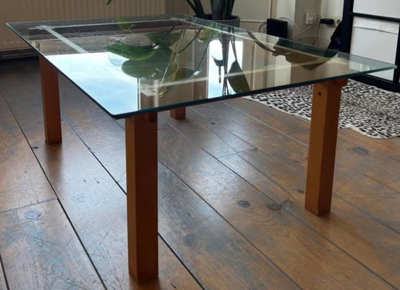 Image 1 of Table basse rectangulaire italienne vintage de style Fontana Arte, en bois et en verre, datant des années 1970.