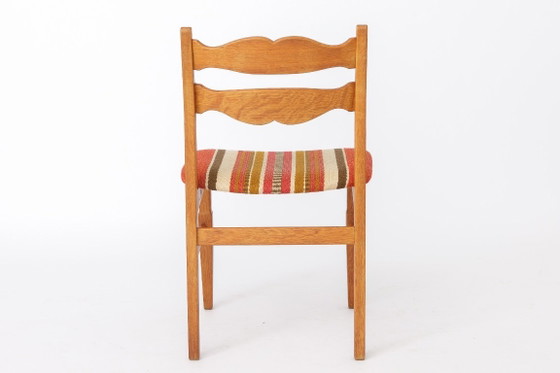 Image 1 of Ensemble de 4 chaises de salle à manger en chêne Henning Kjærnulf | Danois Moderne | EG Mobilier | années 1970