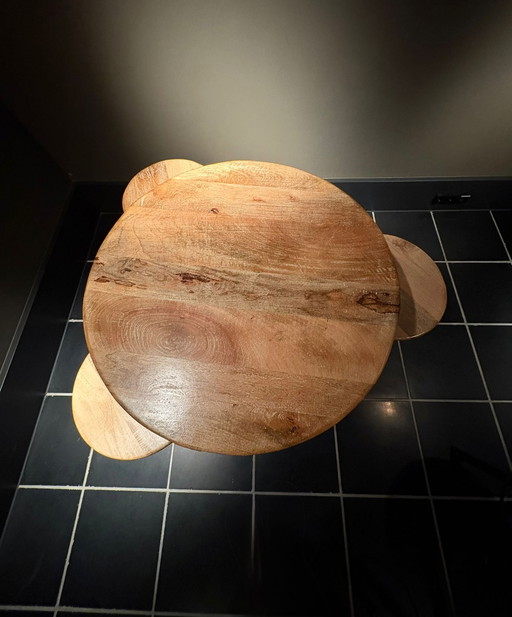 High wooden table with 3 stools