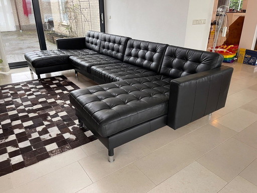 Großes schwarzes Ledersofa mit Chaiselongue