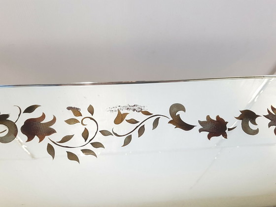 Image 1 of Vintage salontafel uit de jaren 40, groen smeedijzer met spiegelblad en vogeldecoratie.