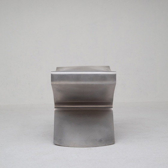 Image 1 of Metalen stoel en bijzettafelset van Xavier Lust