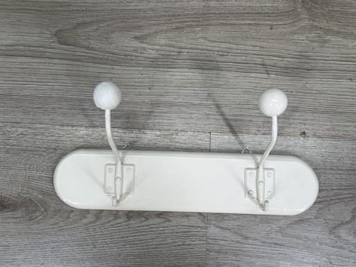 Mid-century white coat rack with spherical hooks