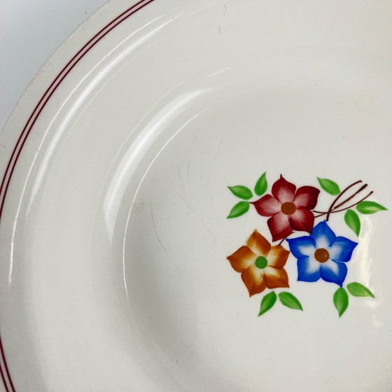 Image 1 of Round plate with rim "The Beehive", Moulins des Loups, 20th century