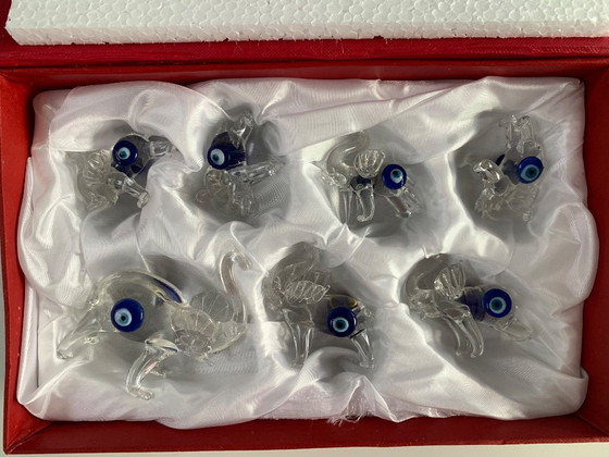 Image 1 of Famiglia di elefanti dagli occhi azzurri in confezione regalo