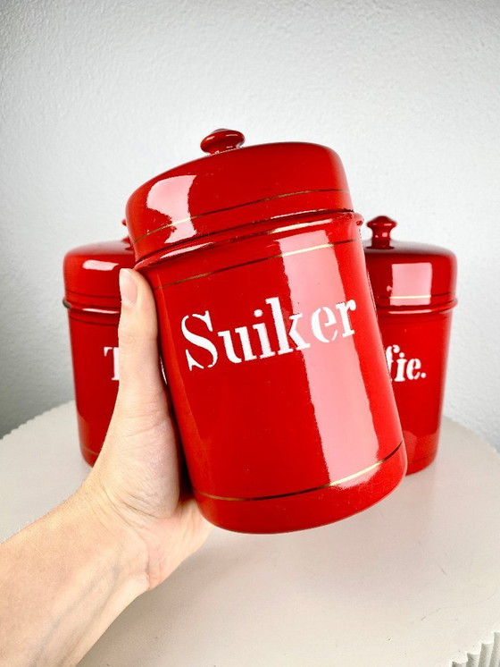Image 1 of Vintage Red Kitchen Canisters for Tea, Sugar & Coffee  – Dutch Retro Enamel Kitchen Storage Tins – Old European Kitchen Storage 